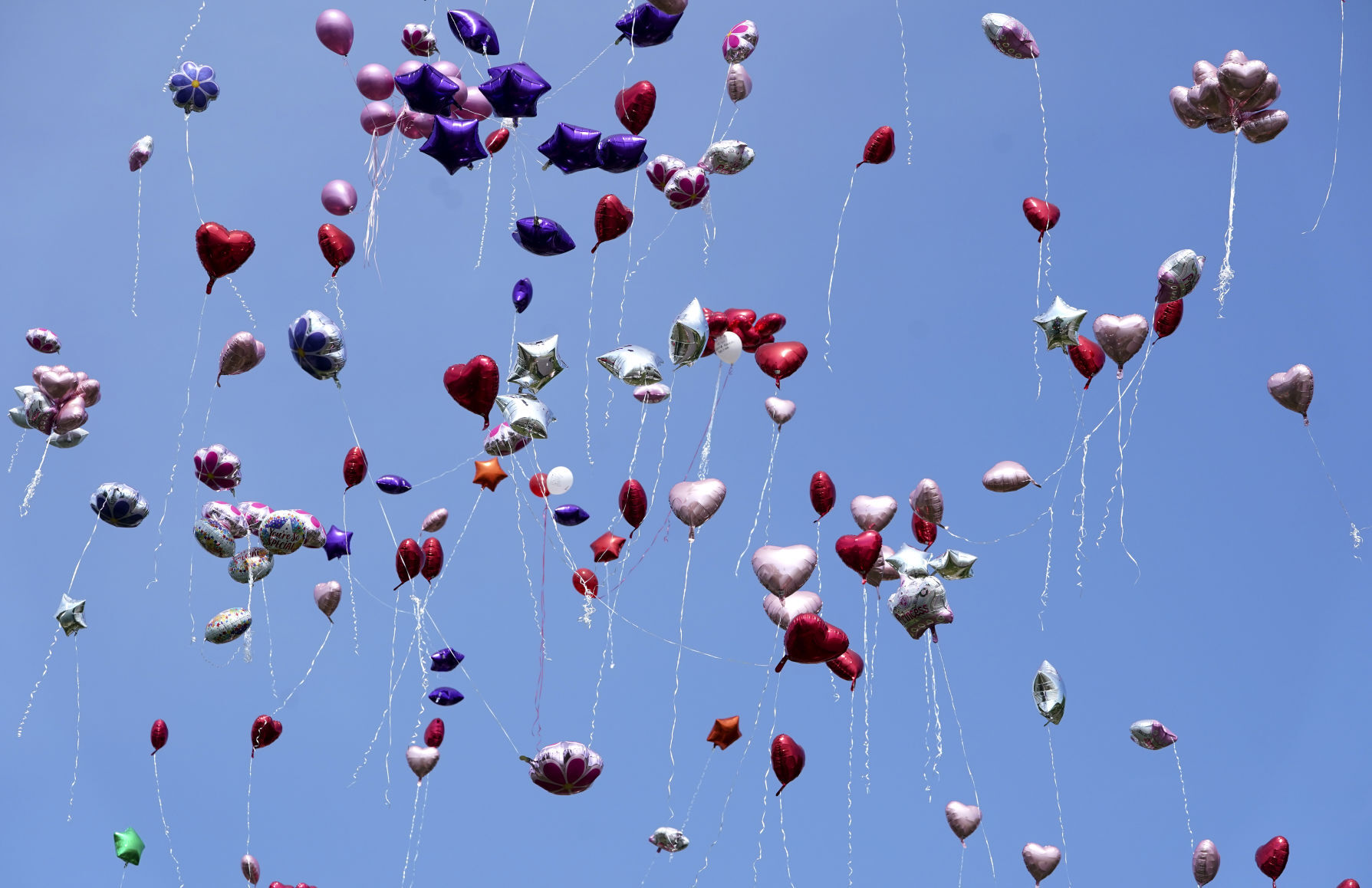 Mourners gather in park